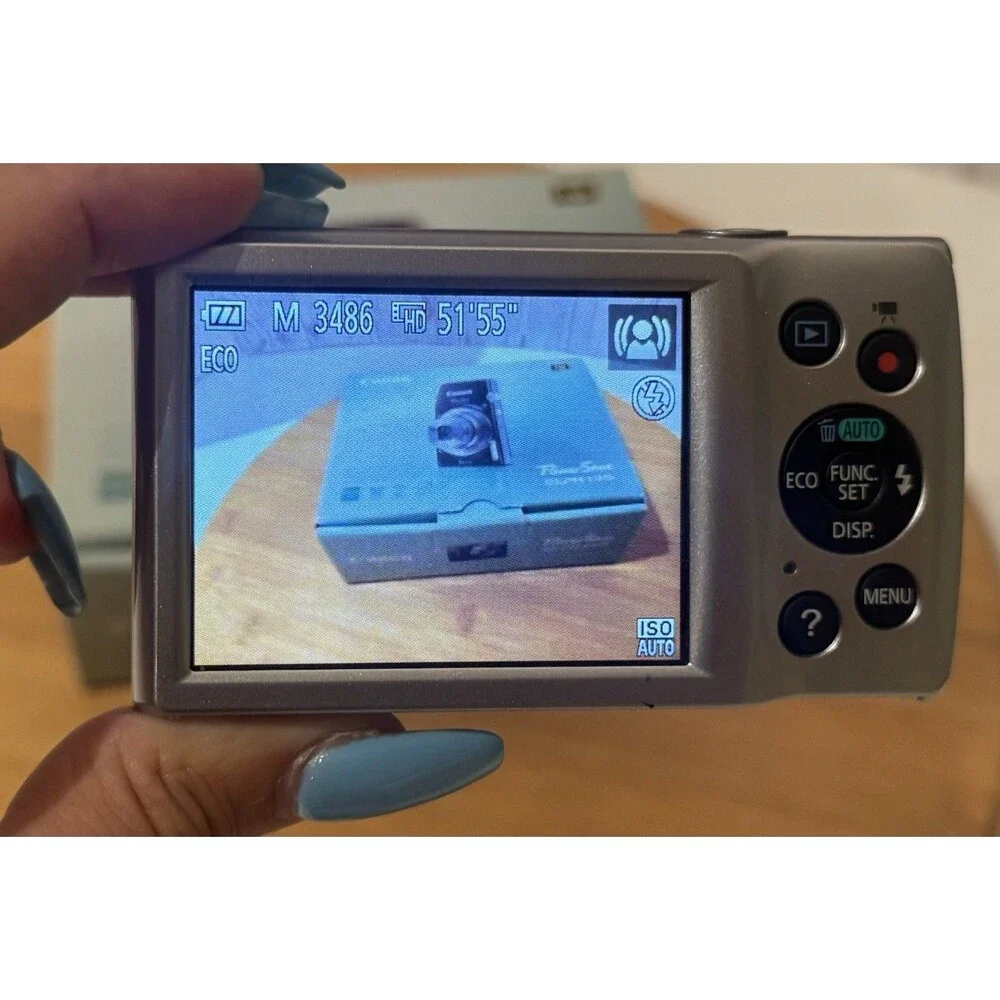 Canon PowerShot ELPH 135 16MP Digital Camera Silver Battery, Charger Etc. Clean